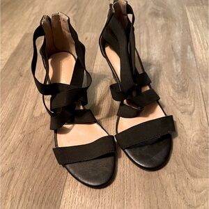 Black Liz Claiborne sandals. Elastic straps. Size 7